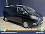 Ford Transit Custom 2.0 TDCI 130pk Automaat L2H1 Euro6 Airco | Camera | Navigatie | Apple Carplay | LED | Cruisecontrol LM velgen, Stoelverwarming, Verwarmde voorruit, Trekhaak, Parkeersensoren, Dakdragers, Bijrijdersbank