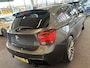 BMW 1-Serie M135i xDrive High Executive 6 Cilinder | Panoramadak | Harman/Kardon | Lederen bekleding | Memory seats | Achteruitrijcamera | M Sport stuur | Adaptief onderstel | Cruise control | Climate control | Stoelverwarming
