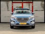 Hyundai Tucson 1.6 T-GDi Comfort 180 PK | Trekhaak 1.900kg | Origineel NL | Stoelverwarming | Navigatie | Camera | Achterbank Verwarmd | Cruise Control | Climate Control | All Season Banden | Metallic Lak | Parkeersensoren |