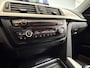 BMW 3-Serie Touring 320d High Executive Trekhaak|Cruise|Navi|Xenon