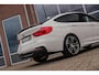 BMW 3-Serie Gran Turismo 320i High Executive M-sport | NL auto | Facelift | Carplay | Sportstoelen | Memory | Panoramadak | 19 inch | Spiegelpakket | Climate control | PDC | Navigatie