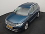Volkswagen Tiguan 1.4 TSI eHybrid Elegance PHEV 245pk Dealer O.H. | Trekhaak Af Fabriek | Adaptive Cruise | IQ Light | Camera | Lederen Comfortzetels Memory & Verwarmd | Sfeerverlichting | Apple Carplay | Stuur Verwarmd | Navigatie | DAB | Plug In Hybrid |