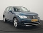 Volkswagen Tiguan 1.4 TSI eHybrid Elegance PHEV 245pk Dealer O.H. | Trekhaak Af Fabriek | Adaptive Cruise | IQ Light | Camera | Lederen Comfortzetels Memory & Verwarmd | Sfeerverlichting | Apple Carplay | Stuur Verwarmd | Navigatie | DAB | Plug In Hybrid |