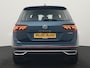 Volkswagen Tiguan 1.4 TSI eHybrid Elegance PHEV 245pk Dealer O.H. | Trekhaak Af Fabriek | Adaptive Cruise | IQ Light | Camera | Lederen Comfortzetels Memory & Verwarmd | Sfeerverlichting | Apple Carplay | Stuur Verwarmd | Navigatie | DAB | Plug In Hybrid |