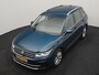 Volkswagen Tiguan 1.4 TSI eHybrid Elegance PHEV 245pk Dealer O.H. | Trekhaak Af Fabriek | Adaptive Cruise | IQ Light | Camera | Lederen Comfortzetels Memory & Verwarmd | Sfeerverlichting | Apple Carplay | Stuur Verwarmd | Navigatie | DAB | Plug In Hybrid |