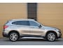 BMW X1 sDrive20i Orange Edition II * Sportstoelen * Panoramadak * Head-up * Trekhaak *