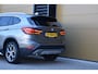 BMW X1 sDrive20i Orange Edition II * Sportstoelen * Panoramadak * Head-up * Trekhaak *