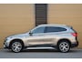 BMW X1 sDrive20i Orange Edition II * Sportstoelen * Panoramadak * Head-up * Trekhaak *
