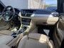 BMW X1 sDrive20i High Executive 184 pk AUT. | panoramadak | navigatie | trekhaak | beige leder interieur | sportstoelen
