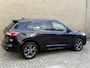 Ford Kuga 2.5 PHEV 225pk | ST-Line X | Navigatie | Camera | Black package | Full-LED | DAB | Keyless entry&start |Apple CarPlay / Android Auto | Sportstoelen | 18 inch velgen | Cruise control | Lane assist | Stoel&stuurverwarming | Bang&Olufsen audio | Elektrische achterklep | Volledig dealeronderhouden
