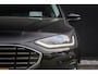 Ford Focus Wagon 1.0 EcoBoost Hybrid Titanium | Adaptieve cruise | Dodehoek detectie | Head-up display | LED verlichting | AGR-stoel | Winter-pack | Parkeer-camera | Nieuw model | Keeless | Elec. achterklep
