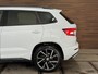 Skoda Karoq 1.5 TSI DSG 4x4 Sportline Business | 1800KG Trekgewicht | Carplay | Sportstoelen | Camera
