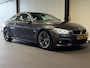 BMW 4-Serie Coupé 420i High Executive (M-SPORT, STOELVERWARMING, LEER, PARKEERSENSOREN)