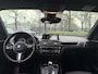 BMW 1-Serie 118i Edition M Sport Shadow High Executive | SCHUIFDAK | ACHTERUITRIJCAMERA | STUURVERWARMING | STOELVERWARMING | LEDEREN BEKLEDING | MAXTON PAKKET | CLIMATE CONTROL | CRUISE CONTROL |
