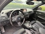 BMW 1-Serie 118i Edition M Sport Shadow High Executive | SCHUIFDAK | ACHTERUITRIJCAMERA | STUURVERWARMING | STOELVERWARMING | LEDEREN BEKLEDING | MAXTON PAKKET | CLIMATE CONTROL | CRUISE CONTROL |