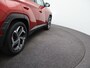 Hyundai Tucson 1.6 T-GDI PHEV Premium Sky 4WD | 360 graden camera | Stoelverwarming en stoelverkoeling | Schuif/ kantel dak | Draadloze telefoon oplader |
