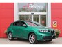 Alfa Romeo Tonale 1.3T PHEV 280PK TRIBUTO ITALIANO | PANORAMISCH SCHUIF / KANTELDAK | ZWART DAK | ZWART LEDEREN BEKLEDING MET RODE ACCENTEN/ GEBORDUURD "TRIBUTO ITALIANO" LOGO OP HOOFD STEUNEN | VOORSTOELEN / STUUR VERWARMD | VOORSTOELEN ELEKTRISCH VERSTELBAAR | DRAADLOOS APPLE CARPLAY / ANDROID AUTO | 360° CAMERA | AUTOMATISCH DIMMENDE BUITENSPIEGELS | 20"INCH LICHTMETALEN VELGEN | ADAPTIVE CRUISE CONTROL | KEYLESS ENTRY / START | ELEKTRISCH BEDIENBARE ACHTERKLEP | DRAADLOZE TELEFOONLADER | AMBIENT LIGHTING | DONKERE HEMELBEKLEDING | SCHAKELFLIPPERS AAN HET STUUR | VERWARMDE RUITENSPROEIERS |