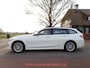 BMW 3-Serie Touring 320e xDrive FACELIFT WIDESCREEN / CARPLAY / TREKHAAK / SPORTLEER