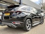 Hyundai Tucson 1.6 T-GDI PHEV Premium Sky 4WD / Automaat / NL-Auto / Vol-Leder / Open-Panodak / Adaptieve Cruise-Control / Stoelverwarming V+A / Stoelverkoeling / Stuurverwarming / Elektr.-Verstelbare Stoelen met Geheugen / Premium Krell-Audio / Elektr.-Achterklep / Apple-Carplay & Android-Auto / Dodehoek-Detectie / Draadloze-Telefoonlader / Keyless / LED / Adaptieve-Koplampen / DAB Radio-Bluetooth / Navi / Flippers / PDC V+A met Rondom-Camerazicht / 19'' LMV / ENZ.