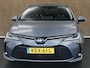 Toyota Corolla 1.8 Hybrid Active - AFNEEMBARE TREKHAAK - TREKGEWICHT 750 KG - NAVIGATIE - CLIMATE CONTROL - 17 INCH LICHT METALEN VELGEN - KEYLESS ENTRY/ START- CAMERA - ADAPTIEVE CRUISE CONTROL - LENDESTEUN VERSTELLING BESTUURDERSSTOEL - PARKEERSENSOREN VOOR/ ACHTER - VOLLEDIG DEALER ONDERHOUDEN