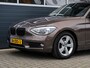 BMW 1-Serie 114i Upgrade Edition | Leder | Schuifdak | Xenon | Sportstoelen | PDC
