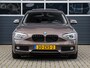 BMW 1-Serie 114i Upgrade Edition | Leder | Schuifdak | Xenon | Sportstoelen | PDC