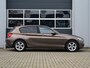 BMW 1-Serie 114i Upgrade Edition | Leder | Schuifdak | Xenon | Sportstoelen | PDC