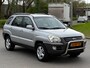 Kia Sportage 2.0 CVVT Adventure 4WD|NAVI|CARPLAY|CRUISE|HALFLEDER|AIRCO|TREKHAAK|