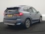 BMW iX1 xDrive30 Launch Edition 313pk 67 kWh Dealer O.H 96.5% SOH | Panodak | Adaptive Cruise | 360 Camera | Lederen Comfortzetels Massage & Memory | Head Up | Harman Kardon | Keyless |