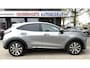 Ford Puma 125 Pk Titanium X Benzine * Navigatie * Adaptive Cruise Control * Achteruitrij Camera * 18" L.M. Velgen * Vingerhoets; Vierde Generatie Eersteklas Service. Al meer dan 100 jaar een begrip in de Brabantse Kempen.