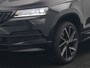 Skoda Karoq 1.5 TSI ACT Sportline 150pk DSG Dealer O.H | Trekhaak Afn. | Panodak | RS Sportstoelen Verwarmd | Adaptive Cruise | Sfeerverlichting | Camera | Apple Carplay | Keyless | Navigatie | DAB | 19" L.M |