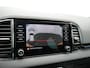 Skoda Karoq 1.5 TSI ACT Sportline 150pk DSG Dealer O.H | Trekhaak Afn. | Panodak | RS Sportstoelen Verwarmd | Adaptive Cruise | Sfeerverlichting | Camera | Apple Carplay | Keyless | Navigatie | DAB | 19" L.M |