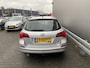 Opel Astra Sports Tourer 1.4 Turbo Cosmo Clima, Half Leder, CC, Schuif/Kantel, LM, Afn.Trekh, nw. APK – Inruil Mogelijk –