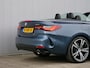 BMW 4-Serie Cabrio 420i High Executive 184 Pk Automaat Navi / DAB / Apple Carplay / Leer / HUD / Windscherm / Nekverwarming