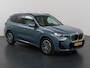 BMW iX1 eDrive20 67 kWh M-Pakket | SOH 98% | Panormadak | Sportstoelen | Curved Display | Harman/Kardon | Camera | Apple CarPlay/Android Auto | Ele.verstelbare stoelen + Geheugen | Ele. kofferdeksel |