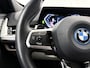 BMW iX1 eDrive20 67 kWh M-Pakket | SOH 98% | Panormadak | Sportstoelen | Curved Display | Harman/Kardon | Camera | Apple CarPlay/Android Auto | Ele.verstelbare stoelen + Geheugen | Ele. kofferdeksel |