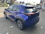 Toyota Yaris Cross 1.5 Hybrid 130 Dynamic + Comfort Pack dodehoekdetectie / stoelverwarming / stuurwielverwarming / parkeersensoren voor + achter / Navigatie / Apple Carplay / Android Auto / parkeercamera / 10 jaar Toyota garantie / rijklaarprijs incl. Toyota Pechhulppas