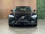 Volvo V90 T6 AWD Recharge R-Design | Schuifdak | Trekhaak | Harman Kardon | Adaptieve Cruise Control | Standkachel met Volvo On Call App | Stoelverwarming voor+achter | Stuurwielverwarming | Pilot Assist | BLIS Dode Hoek Detectie | Parkeercamera | Elektrische voorstoelen geheugen | Lederen bekleding | Zitting verlenging voorstoelen | 18 Inch | Keyless Drive | Parkeersensoren voor+achter | Elektrisch bedienbare achterklep | DAB Radio | Apple Carplay/Android Auto | Volvo On Call met mobiele App functie | Onyx Black Metallic |