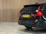 Volvo V60 T6 AWD Recharge Ultra Dark | Trekhaak | 360° Camera | Schuifdak | Head-Up Display | Harman Kardon | 19 Inch | Adaptieve Cruise Control | Stoelverwarming voor+achter | Stuurwielverwarming | Full LED Meesturende koplampen | Pilot Assist | BLIS Dode Hoek Detectie | Elektrische voorstoelen geheugen | Lederen bekleding | Zitting verlenging voorstoelen | Lederen dashboard | Google Infotainment | Keyless Drive | Parkeersensoren voor+achter | Privacy Glass | Elektrisch bedienbare achterklep | DAB Radio | Apple Carplay/Android Auto | Volvo On Call met mobiele App functie | Onyx Black Metallic |