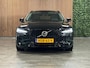 Volvo V60 T6 AWD Recharge Ultra Dark | Trekhaak | 360° Camera | Schuifdak | Head-Up Display | Harman Kardon | 19 Inch | Adaptieve Cruise Control | Stoelverwarming voor+achter | Stuurwielverwarming | Full LED Meesturende koplampen | Pilot Assist | BLIS Dode Hoek Detectie | Elektrische voorstoelen geheugen | Lederen bekleding | Zitting verlenging voorstoelen | Lederen dashboard | Google Infotainment | Keyless Drive | Parkeersensoren voor+achter | Privacy Glass | Elektrisch bedienbare achterklep | DAB Radio | Apple Carplay/Android Auto | Volvo On Call met mobiele App functie | Onyx Black Metallic |
