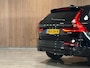 Volvo XC60 T6 AWD Recharge Ultra Dark | Luchtvering | Trekhaak | 360° Camera | Head-Up Display | Harman Kardon | Adaptieve Cruise Control | Stoelverwarming voor+achter | Stuurwielverwarming | Full LED Meesturende koplampen | Pilot Assist | BLIS Dode Hoek Detectie | Elektrische voorstoelen geheugen | Quilted Nordico bekleding | Zitting verlenging voorstoelen | Lederen Dashboard | Schuifdak | 20 Inch | Google Infotainment | Keyless Drive | Parkeersensoren voor+achter | Privacy Glass | Elektrisch bedienbare achterklep | Alarm Klasse III | DAB Radio | Apple Carplay/Android Auto | Draadloos telefoon opladen | Volvo On Call met mobiele App functie | Onyx Black Metallic |