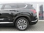 Hyundai Santa Fe 1.6 T-GDI PHEV Premium Plus Sky 7p. TREKHAAK AFNEEMBAAR (1.350KG), PANO, 360° CAMERA, HUD, MEMORY, WINTER PACK, ADAPT. CRUISE, CLIMA, NAVI, PDC V&A, APPLE CARPLAY/ANDROID AUTO, BLIS, KEYLESS, KRELL, ELEKT. ACHTERKLEP, ELEKT. PASSAGIERSSTOEL, STOELVENTILATIE, 39.152KM