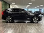 Volvo XC60 T6 AWD Recharge Plus Bright | MY26 Facelift | Trekhaak | 360° Camera | Harman Kardon | Adaptieve Cruise Control | Stoelverwarming voor+achter | Stuurwielverwarming | Pilot Assist | BLIS Dode Hoek Detectie | Elektrische voorstoelen geheugen | Nordico Quilted bekleding | Zitting verlenging voorstoelen | Google Infotainment | 19 Inch | Keyless Drive | Parkeersensoren voor+achter | Privacy Glass | Elektrisch bedienbare achterklep | DAB Radio | Apple Carplay/Android Auto | Draadloos telefoon opladen | Volvo On Call met mobiele App functie | Onyx Black Metallic |