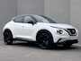 Nissan Juke 1.0 DIG-T Tekna Automaat / Cold Pack / Leder / Navigatie / Camera 360° / Stuur- en stoelverwarming / Voorruitverwarming / Apple Carplay Android / 19" LM + All Season banden /