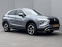 Mitsubishi Eclipse Cross 2.4 PHEV Intense+ / Fabrieksgarantie tot 02-2030 mogelijk / Dealer onderhouden / Navigatie / 1.500 kg afneembare trekhaak / Elektrische bestuurdersstoel / Navigatie / Apple Carplay Android / Stoelverwarming / 18" LM wielen + All Season banden /