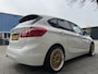 BMW 2-Serie Active Tourer 225xe iPerformance eDrive Hybride - AUTOMAAT I Panorama dak I Navigatie I Airco I PDC I Sport velgen