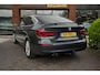BMW 3-Serie Gran Turismo 320i Centennial Executive Cruise control Brake assist Hill hold Koplampreiniging