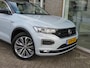 Volkswagen T-Roc 1.5 TSI DSG R-LINE Pano|Digi-Dash|Vol Leder|Winter Pack|Camera|CarPlay|Navi|DAB+|Clima|Cruise|LED|TREKHAAK