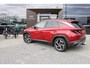Hyundai Tucson 1.6 T-GDI HEV Premium Sky | Achterbank in delen neerklapbaar | Achterbank verwarmd | Achteruitrij assistent