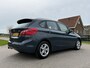 BMW 2-Serie Active Tourer 218i High Executive | 1e Eigenaar | Leder | Navi | Clima | Stoelverwarming | 16" Velgen | PDC | Cruise |